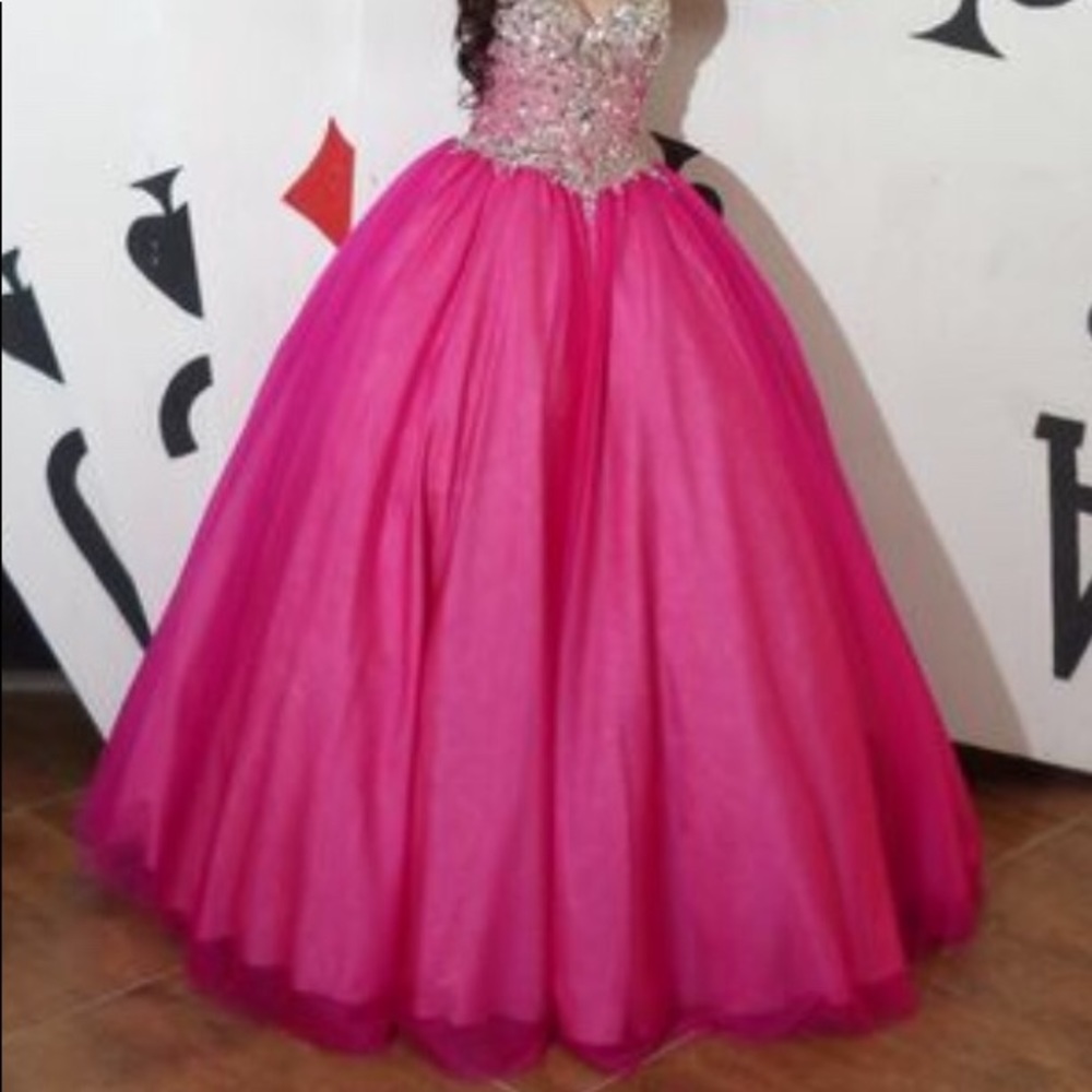 Hot pink prom dress by Terani Couture
